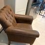 Pair of brown leather chesterfield armchairs Image 2