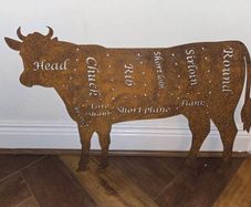 Rusted butchers cow silhouette