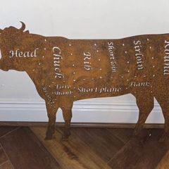 Rusted butchers cow silhouette