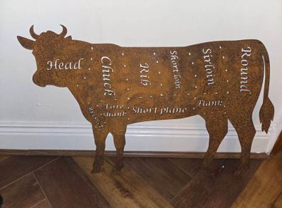 Rusted butchers cow silhouette