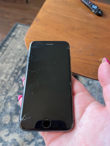 iPhone 8 with cracked screen