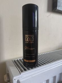 Dripping gold tan