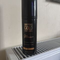 Dripping gold tan