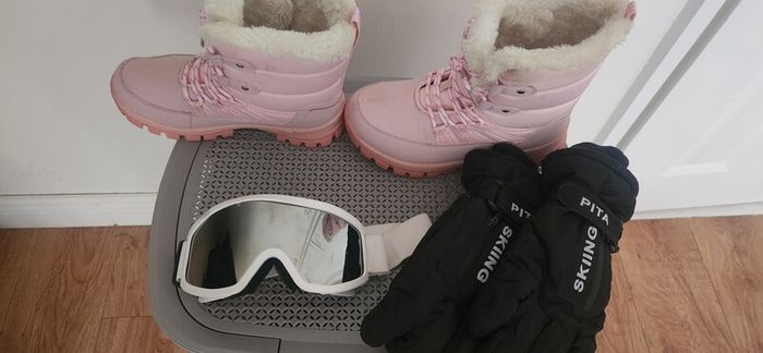 ski boots glasses and gloves