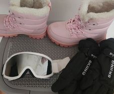 ski boots glasses and gloves