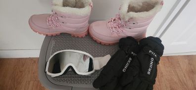 ski boots glasses and gloves