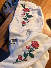 White Hollister hoody with roses