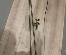 Adjustable curtain holder