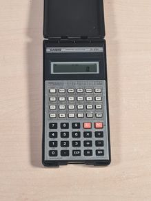 CASIO FX-100c vintage scientific calculator and case