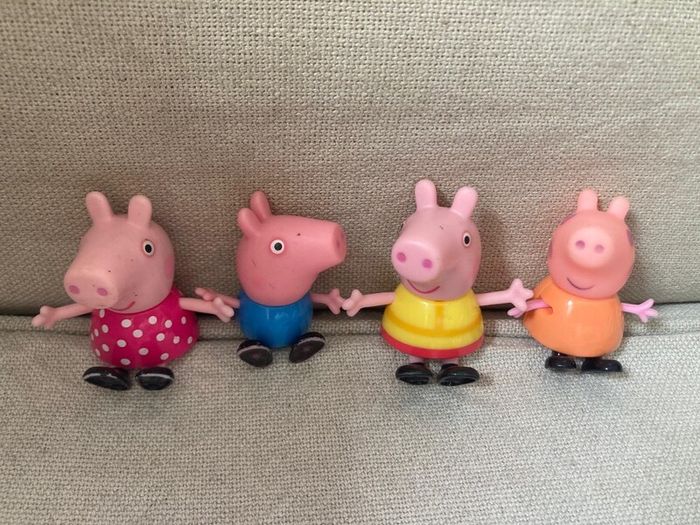 Peppa pig characters and suitcase