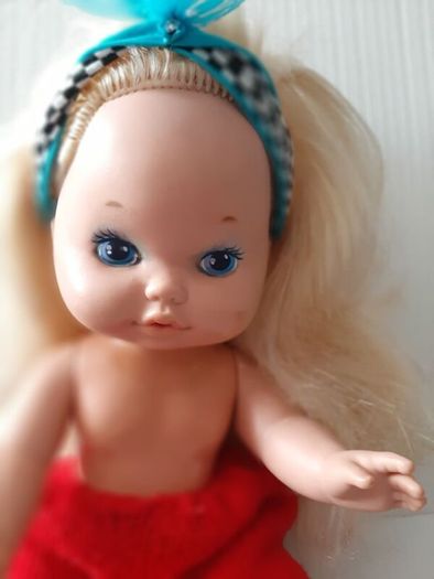 collectable vintage matel doll in original clothes