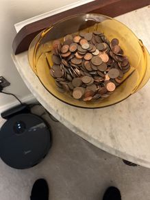Beautiful vase full of old coins