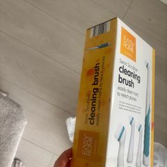 Sonic scrubber cleaning brush