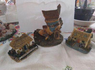Three miniature model houses