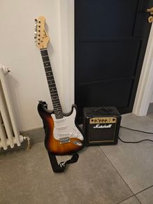 Kids electric guitar and amp stand included-Brand new