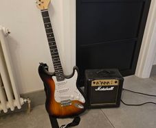Kids electric guitar and amp stand included-Brand new