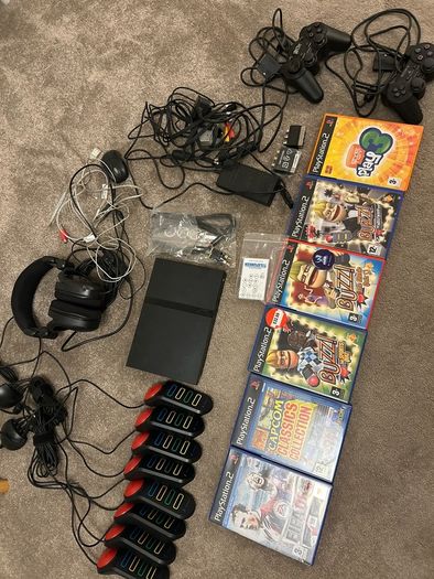 Playstation 2 with games and controllers