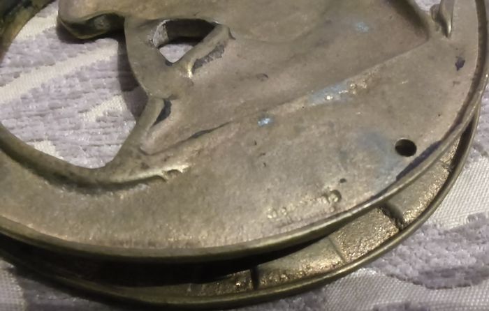 two brass horse shoe door knockers