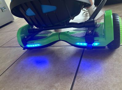 Hovertrax Hoverboard with Go-Kart Attachment.