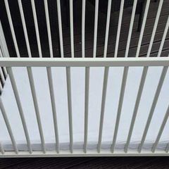 Cot bed with mattress and bedding