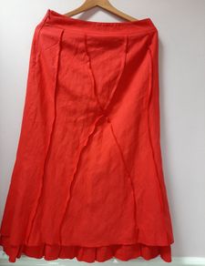 New red designer skirt tag attached fully lined