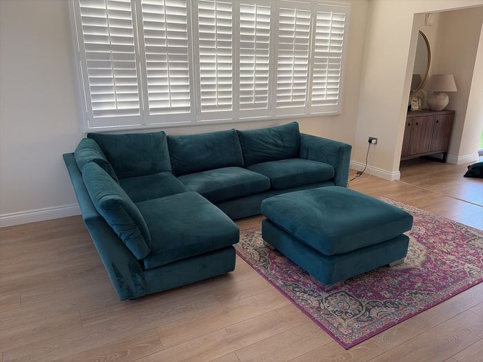 Teal Blue L shaped couch and footstool