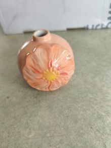 Next small bud vase or candle holder.