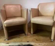 Pair of designer vintage leather armchairs