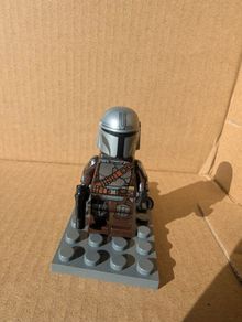 100% Lego LEGO Star Wars Mandalorian with Blaster, Jet Pack, Helmet, & Silver Beskar Armor