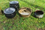 selection of old cast iron pots