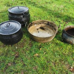 selection of old cast iron pots