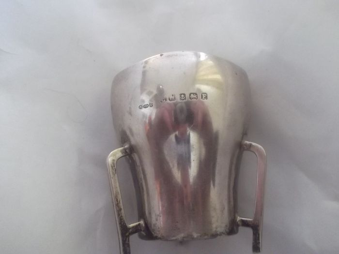 a small  solid silver loving  cup