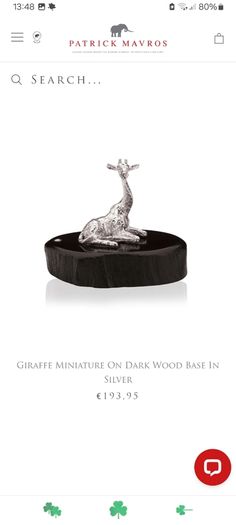 Sterling silver giraffe on Zimbabwean wood, by Patrick Mavros, D18 post 8e