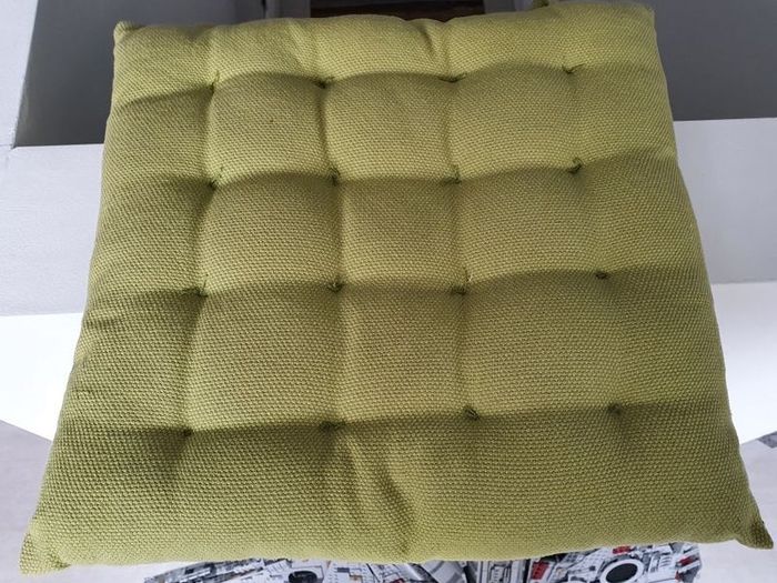 Six lime green garden seat cushions