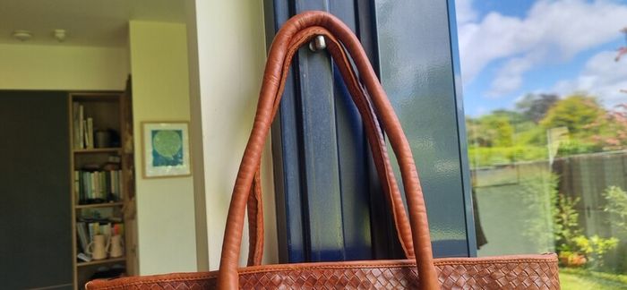 brown leather woven shoulder bag