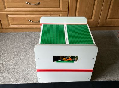 lego box and mixed lego pieces
