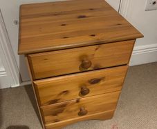 Pine bedside locker with three drawers