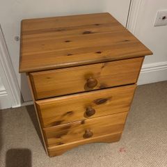 Pine bedside locker with three drawers