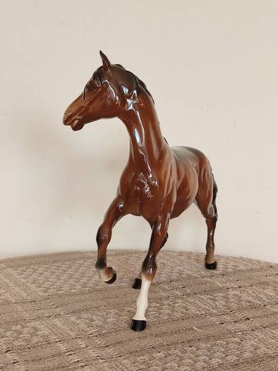 Vintage Royal Doultot porcelain horse. new in the box.
