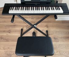Yamaha keyboard for sale with adjustable stand, foot pedal and bench