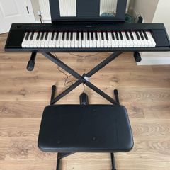 Yamaha keyboard for sale with adjustable stand, foot pedal and bench