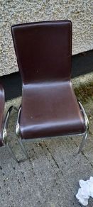 2 brown leatherette chairs