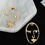 Golden Artistic Face-Shaped Earrings Minimalist Statement Jewelry Image 2