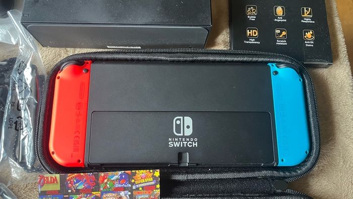 Nintendo Switch OLED, Used Twice + New Case + 4 Screen Protectors