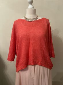 Pink/peach knit top. Size S/M