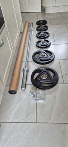 brand new olympic weight lifting set .