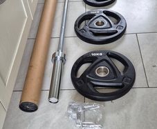 brand new olympic weight lifting set .