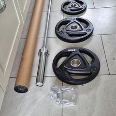 brand new olympic weight lifting set .