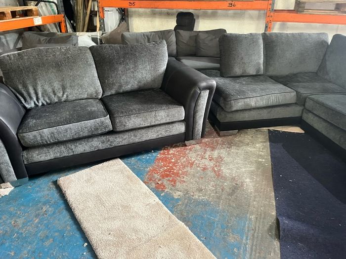 Black corner sofa with matching 2 seater