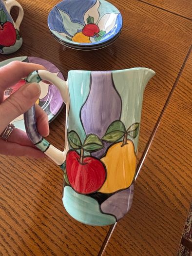 Colourful hand made pottery mugs set